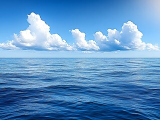 Expansive ocean view meeting with a cerulean sky with billowy clouds