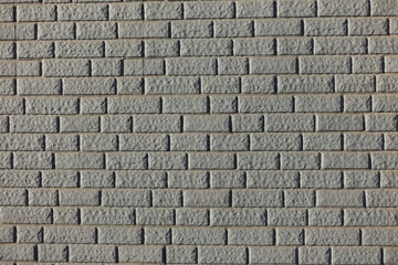 Background - Light grey painted brick veneer wall