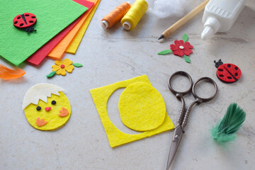 Handmade Felt Easter Chick. DIY Spring Craft Project with Colorful Supplies, Sewing Materials,...