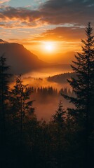 Obraz premium Majestic sunrise over misty mountain valley