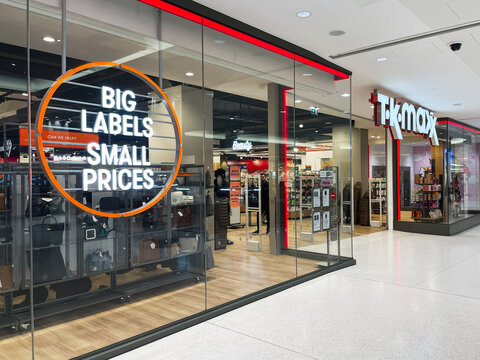 Modern TK Maxx retail store exterior with promotional signage and contemporary glass facade