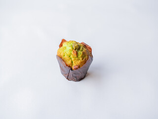 Muffin pistacjowy w papierowej papilotce

