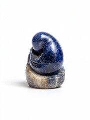 Intricately Carved Sodalite Stone Sculpture on White Background