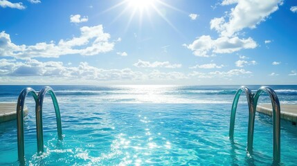Fototapeta premium A serene pool with clear blue water, surrounded by an endless horizon of the ocean under a bright sun