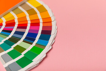 Color palette on a bright colored background. Color palette guide. paper catalog of rainbow color. creative.Palette, samples of trending colors. Color swatches. Decor and interior designer. Top view. 