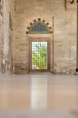Yavuz Sultan Selim Mosque. window in the garden overlooking the outer courtyard.