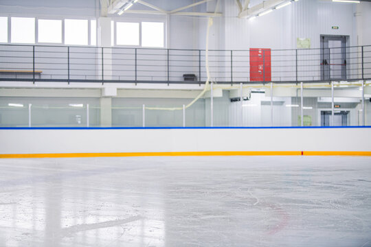 Empty ice rink, ice texture background for product display, indoor ice arena. - Powered by Adobe