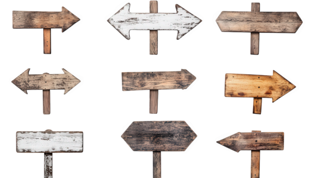 a collection of rustic wooden directional signs. varying in size and style. some with weathered paint and others in natural wood tones they are designed to indicate directions. serving both functional