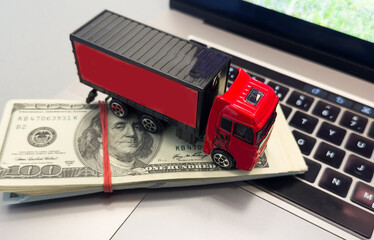 Logistics, and delivery service - Truck on a laptop keyboard. Shopping service on The online web and offers home delivery. 