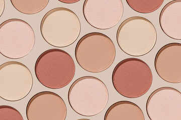 Cosmetics texture pattern, Warm vivid colored eye shadow makeup palette, round eye powder swatches. Female cosmetic and beauty products, aesthetic minimal beauty photo, colorful eyeshade, top view