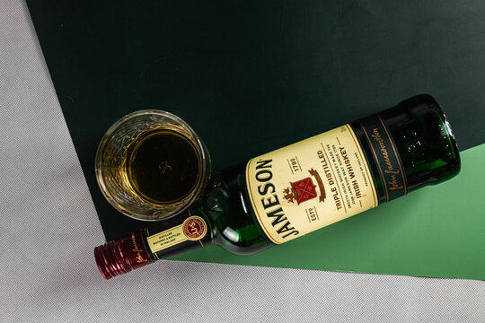 bottle of jameson whiskey on a light background