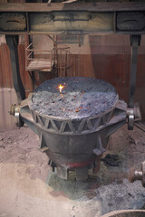 Liquid metal tank pours at the steel mill in iron factory.
