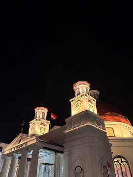 the wall clock tower in Semarang's Kota Lama area is majestic and beautiful