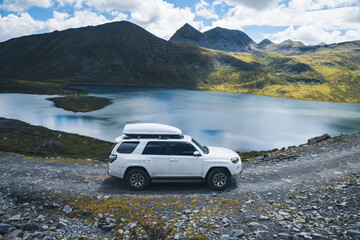 Off road car running  in the high altitude forest mountains
