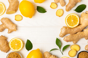 Fresh ginger on wooden background. Dry ginger. Sliced ​​ginger with honey and lemon. Ginger...