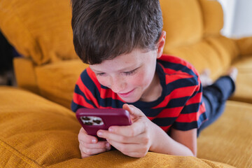 Engaging young mind experiences joy while exploring a smartphone