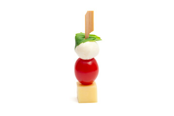 cheese and cherry tomato on a wooden stick on a white background