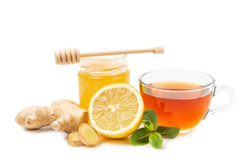 Cup of hot ginger tea with slices of ginger root isolated on white background. Warming drink. Alternative medicine. Tea with honey, lemon, ginger and mint. Space for text. Copy space