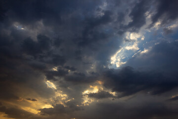 Beautiful sunset in the evening sky with clouds. Nature background.