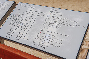 Tactile Braille information board designed for visually impaired individuals