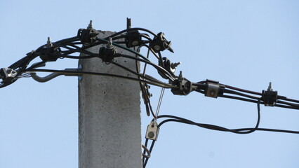 Obraz premium connecting electrical cables on an electric pole