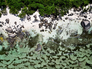 Anse Cocs beach, La Digue Seychelles, tropical beach during a luxury vacation in Seychelles. Tropical beach Anse Cocs beach, La Digue, Praslin, Mahe Seychelles with turqouse colored ocean