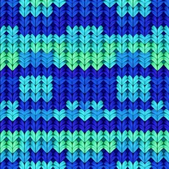 Knitted Blue Pattern: A vibrant and intricate knitted pattern with a repeating design of blue and green hues, offering a warm and textured visual. 