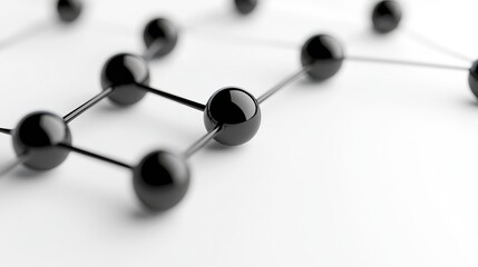 Abstract image of black spheres connected by thin lines against a white background. The spheres are glossy and reflect light. The overall impression is one of connection and network.
