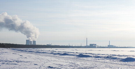 Panoramic winter landscape with the Leningrad Nuclear Plant in winter