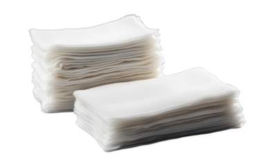 A stack of medical gauze pads, isolated on a empty plain background