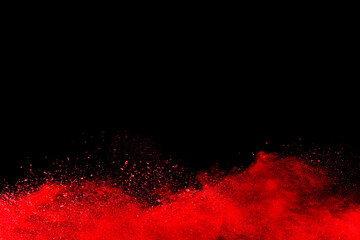 Abstract frame powder splatted background. Red powder explosion on black background copy space. Colored cloud. Colorful dust explode. Paint Holi