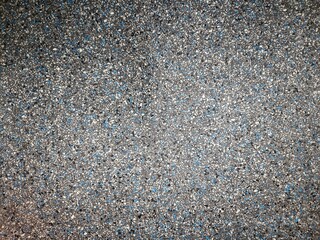 Modern stylish terrazzo floor with stone chips in a polished finish