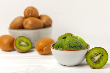 Kiwi dried fruit on wooden background. kiwi candied fruit. Healthy food. Ingredient for baking cupcakes. Healthy snack, vegetarian sweets. Space for text. Copy space
