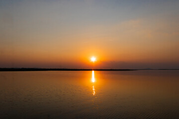 Naklejka premium Beautiful calm lake with sunset in Thailand.
