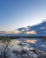 Fototapeta premium The sky is blue and the water is calm