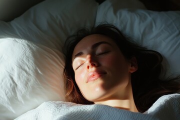 A woman lies peacefully in bed, sunlight illuminating her serene face, representing relaxation, comfort, and the beauty of a quiet moment in a cozy space.
