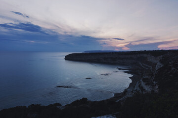 Breathtaking view of a coastal landscape at sunset. Zapallo Bay, Cyprus