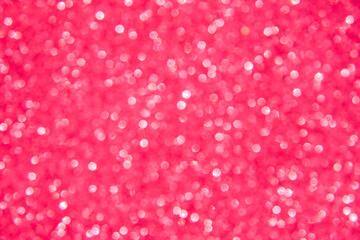 A soft pink bokeh-style background with unfocused light creates an elegant space for text or design elements.