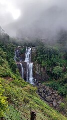huge waterfall in the Sri Lankan jungle
