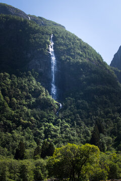 Waterfall scenery in fjord mountains