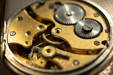 Watchmaker is repairing the mechanical watches in his workshop