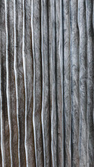 Paper background with straight lines in dark colors. designer background, zigzag shape, old paper shape.