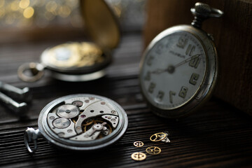 A watch maker repairing a vintage automatic watch.