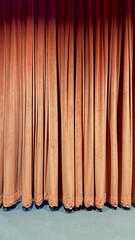 Theater curtains orange with cool blue colors. Curtain design for performance.