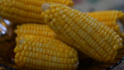 Close up of yellow corn. Background of boiled sweet corn. Stock of fresh corn. Several ears of...