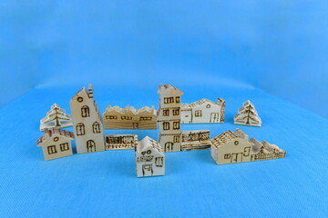 Hand carved soft spruce wood play houses decorated by burning. The houses were made by me.