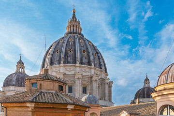 Majestic dome of St. Peter's Basilica against blue sky © Ezio Gutzemberg