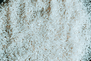 Top view of White rice on a black background