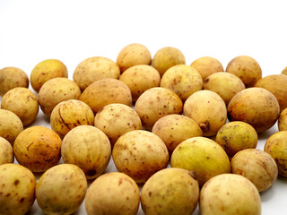 Duku fruit (Lansium parasiticum) is a small tropical fruit with a thin yellow skin and sweet, juicy flesh