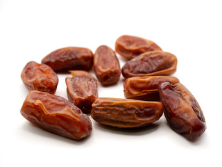 Close-up image of Tunisian dates isolated on a clean white background